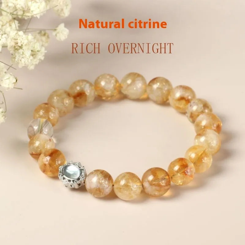 Citrine crystal bracelet with 10mm geometric beads on wrist