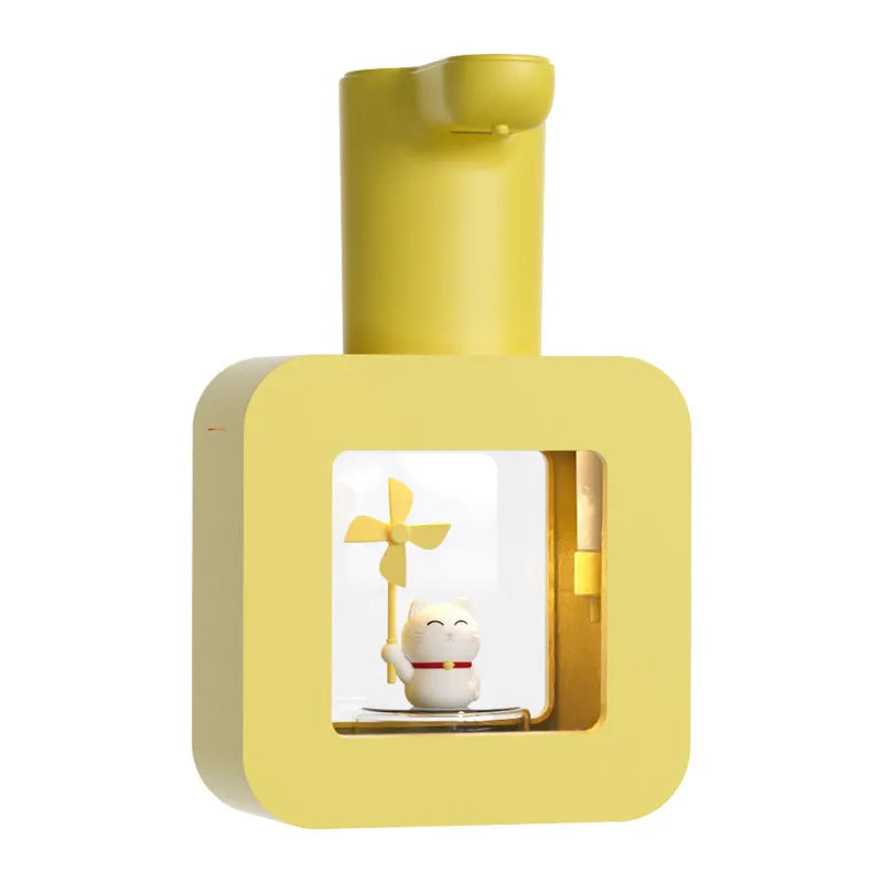 Pink Pet Cube automatic touchless soap dispenser with cartoon unicorn and kitten designs for children.