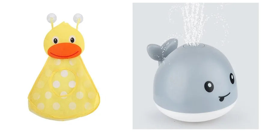 White and blue whale bath toy spraying water with LED lights illuminated