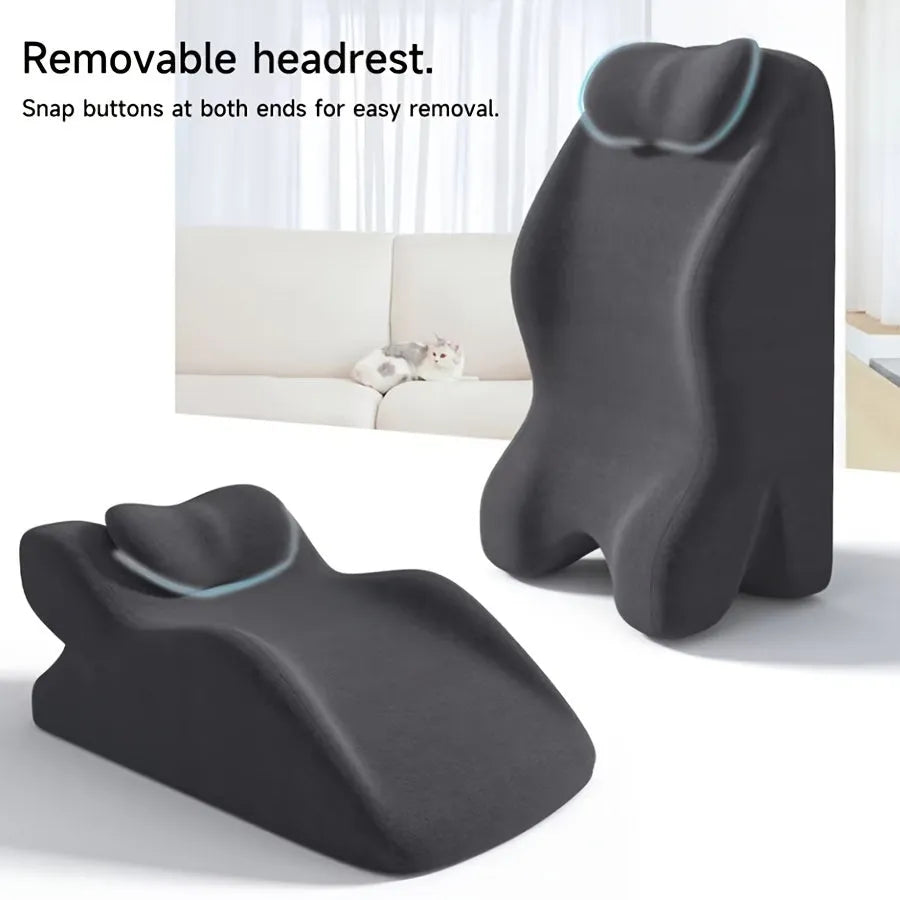 A blue stomach sleeper pillow on a bed, designed for lying face down.