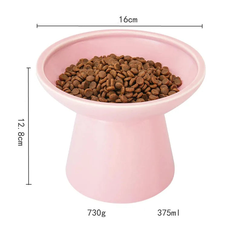 Blue ceramic elevated cat food bowl with wide shallow dish on a white surface.