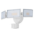 White LED security flood light with motion sensor mounted on an outdoor wall.