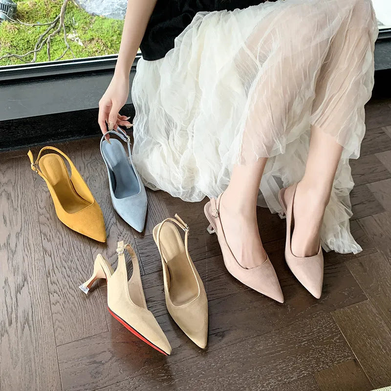 Women's apricot suede pointed-toe stiletto high heels on a light background.