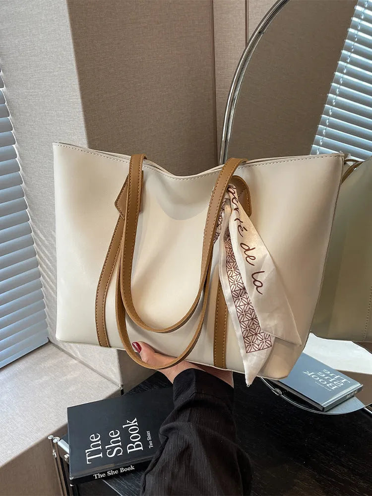 Women's large capacity casual tote shoulder bag in soft bucket design with crossbody strap
