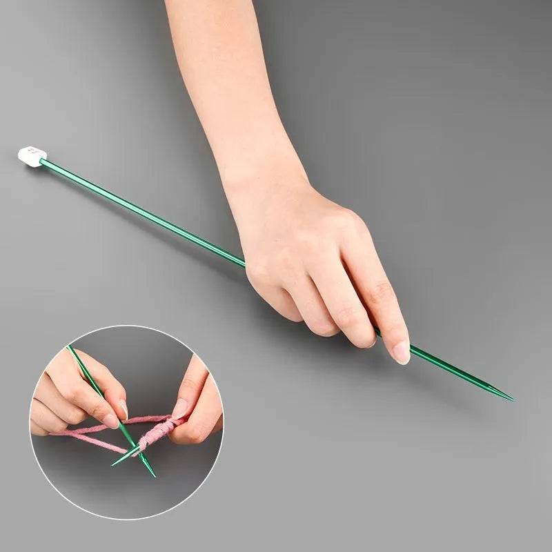 Crochet hook set showing 14 different sizes from 2.0mm to 10.0mm with protective caps and duplicate hooks