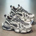 Men's black mesh sports sneakers with platform soles and lace-up front