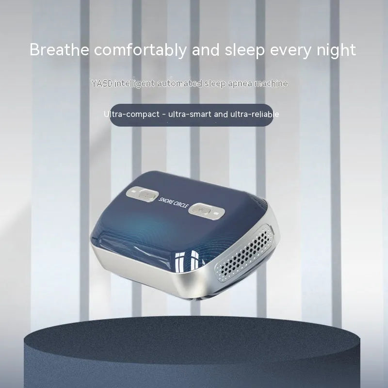 Yunzhongfei dark blue portable anti-snoring ventilator with nose mask and breathing pipeline on a table