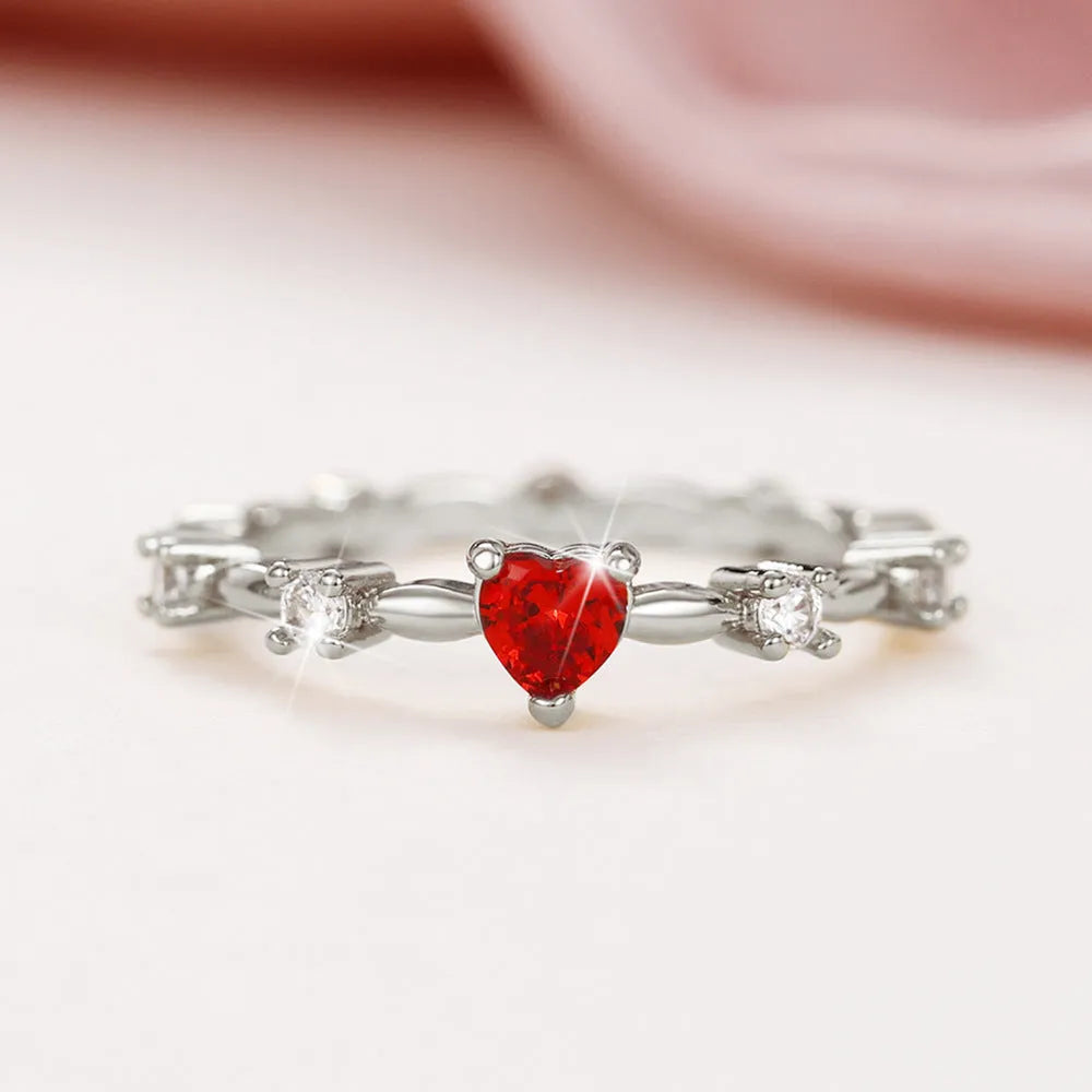 Women's peach heart shape ring with zircon details in gold or silver electroplated finish on copper