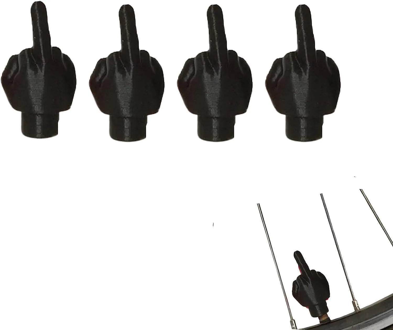 Set of four latex car tyre valve dust caps in black and skin colour tones.