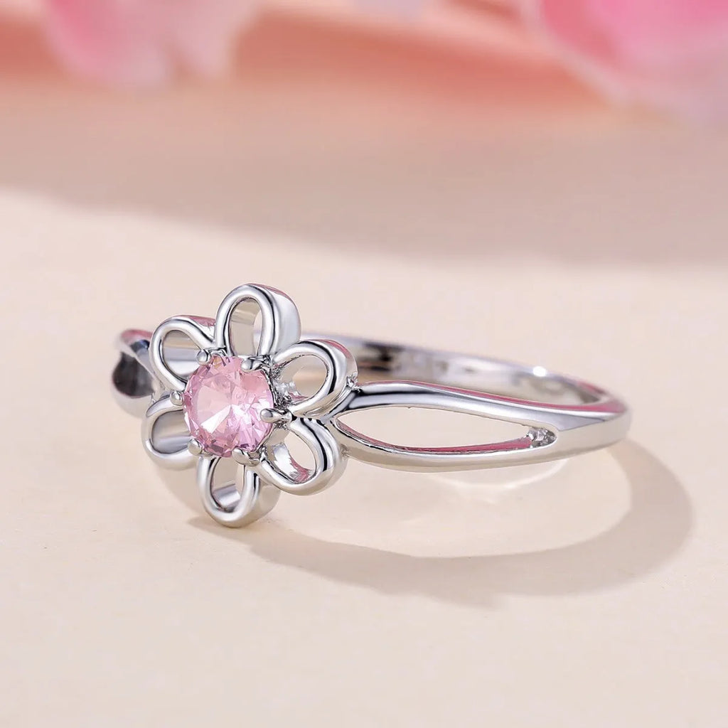 Copper flower hollow fashion ring with platinum pink diamond electroplated finish