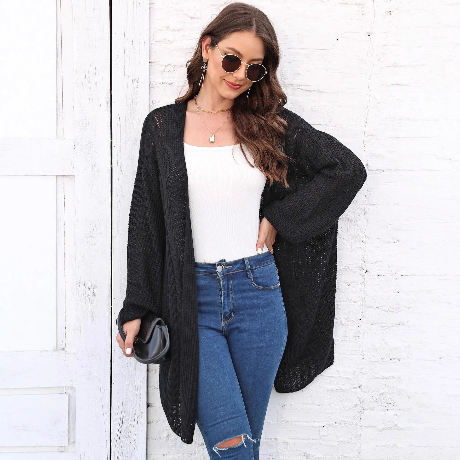 Women's loose fit acrylic sweater coat in solid colour with European styling