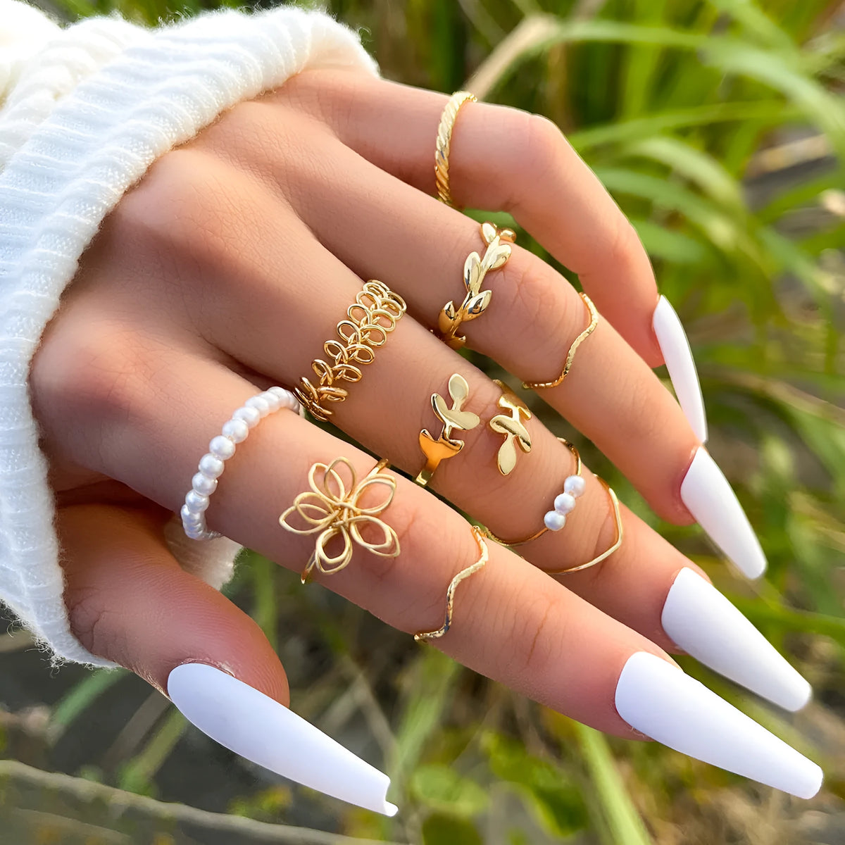 Gold tone openwork flower design alloy ring for women with glossy electroplated finish