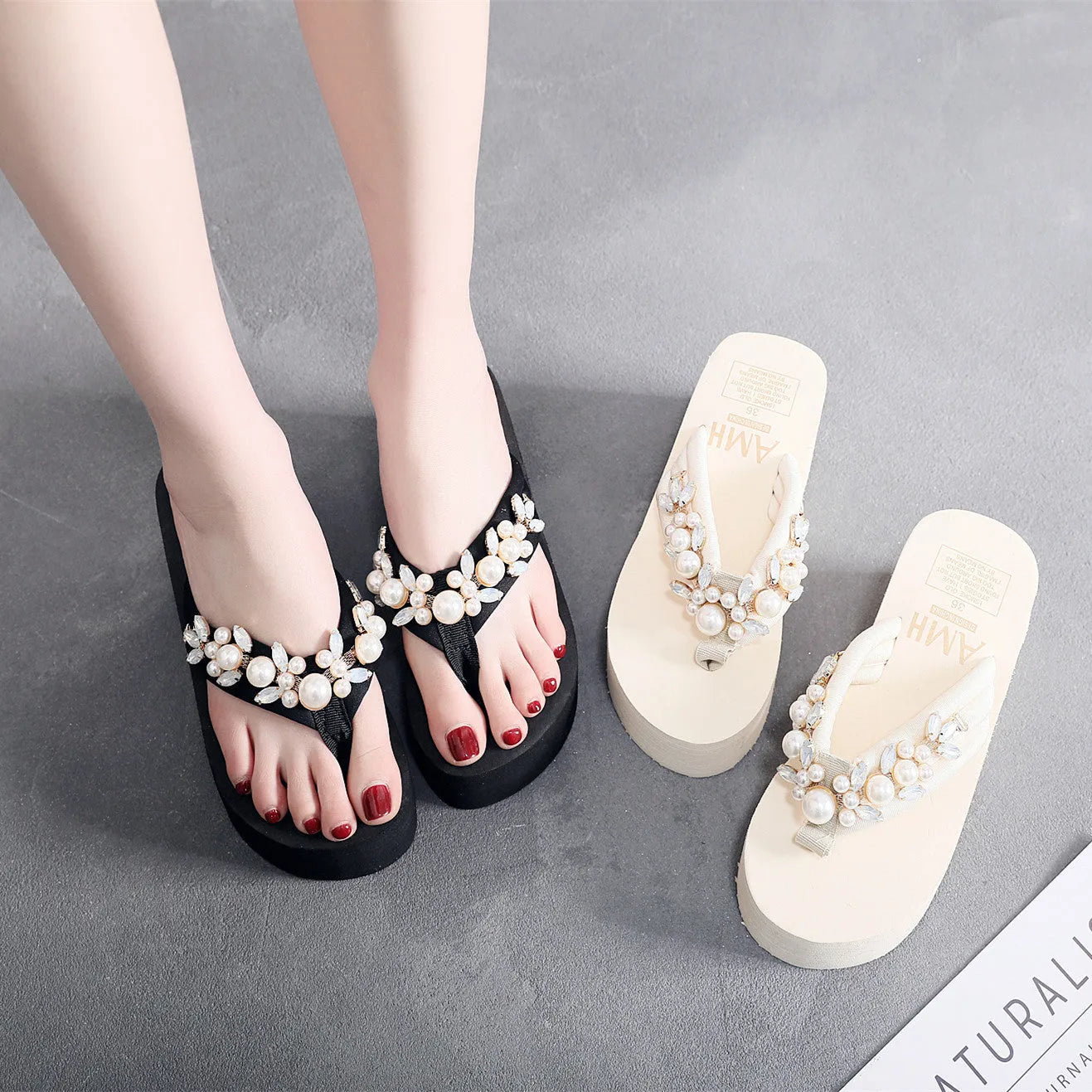 Women's high-heeled flip-flop in cotton cloth, shown in beige colour on a white background.
