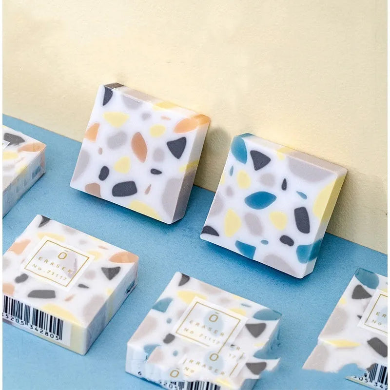 Super Clean Traceless brick-shaped rubber eraser for pencil marks.