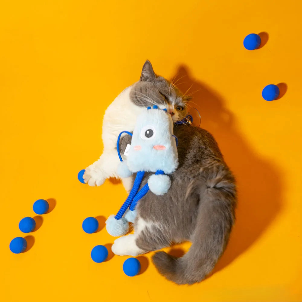 Blue plush cat toy ring with elastic rope and bell on a white background