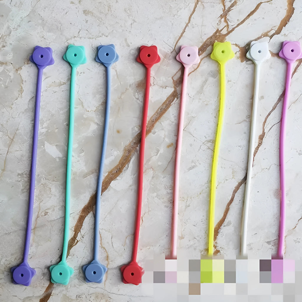 Silicone wire winder with magnet for organising headphone and computer cables in various colours