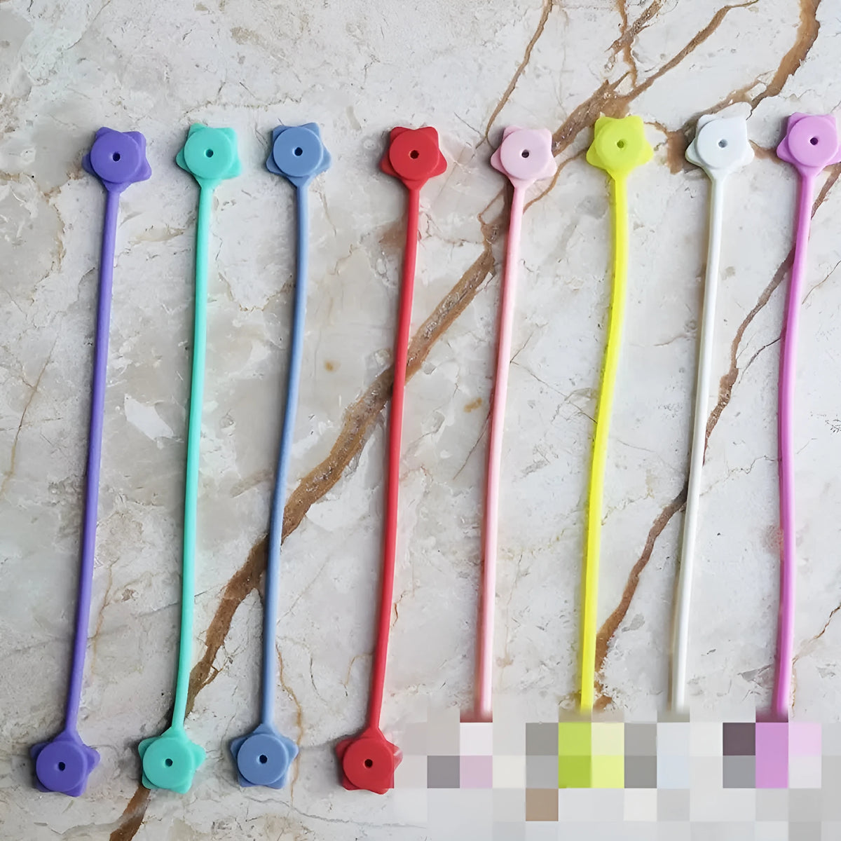 Silicone wire winder with magnet for organising headphone and computer cables in various colours