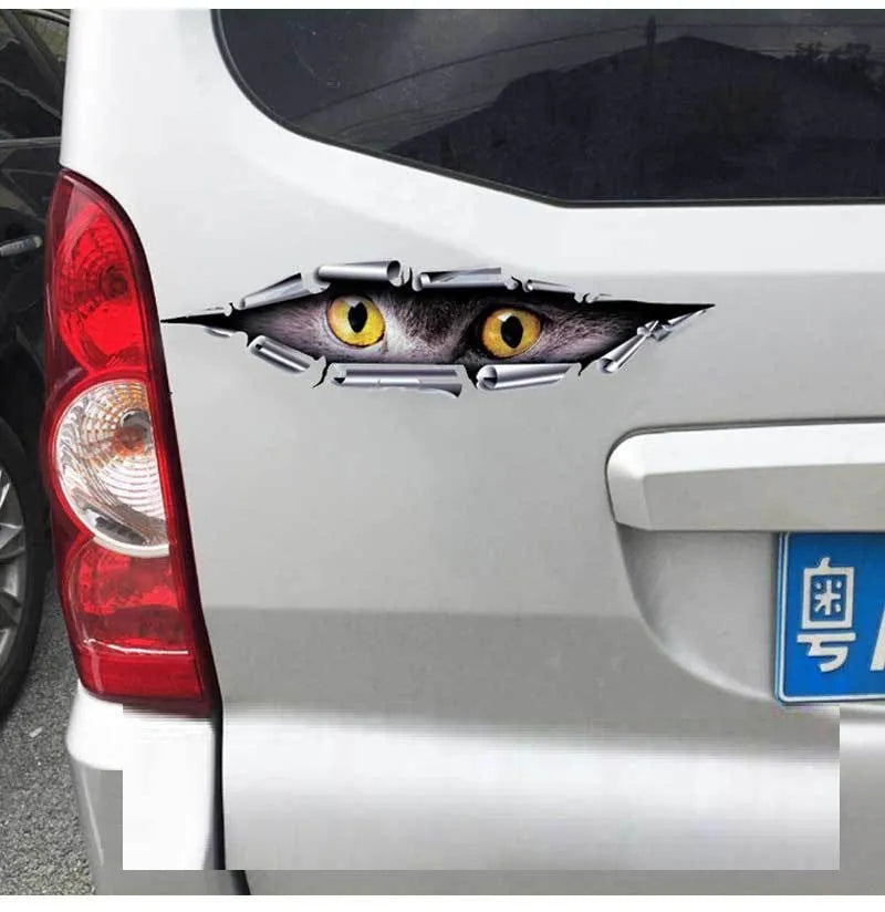 3D Tiger Eye and Eagle Eye car bumper sticker on vehicle door measuring 10x35cm