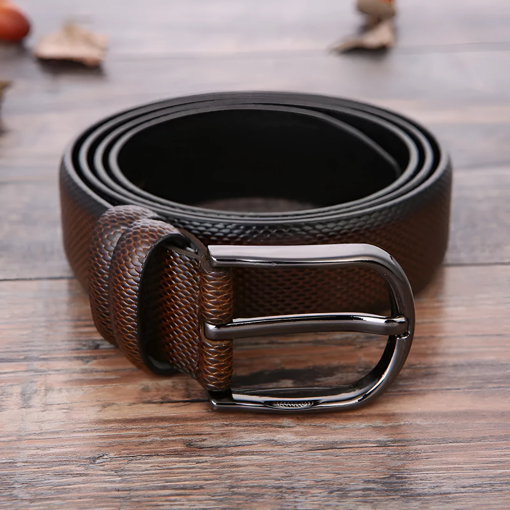 Men's black business belt with alloy pin buckle showing a laser-etched elephant pattern design.