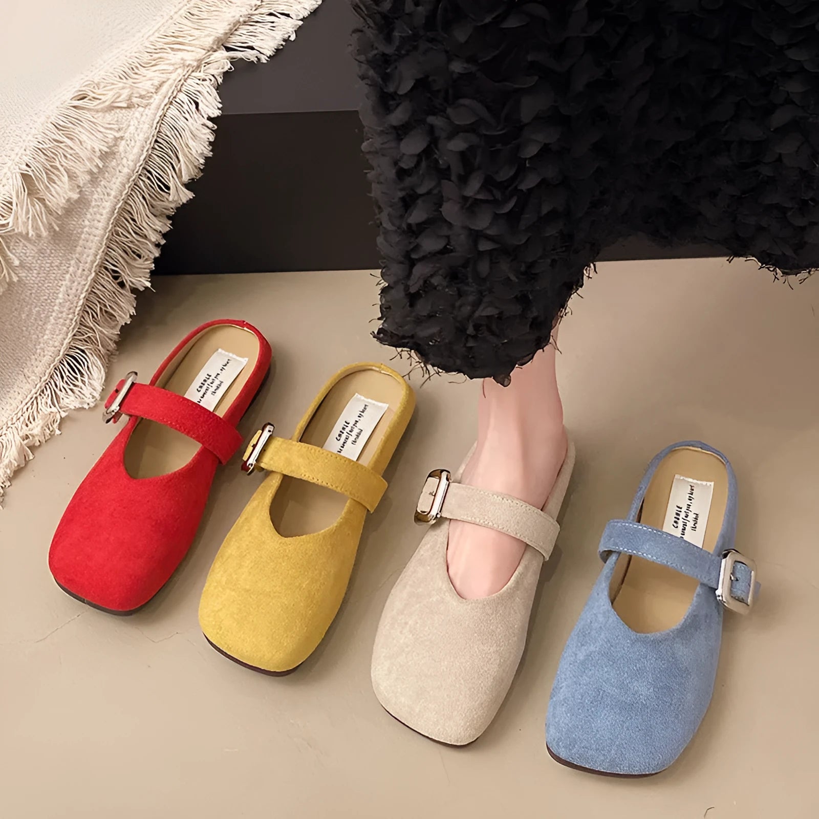 Women's flat apricot slippers with square closed toe, PU upper, and rubber sole.