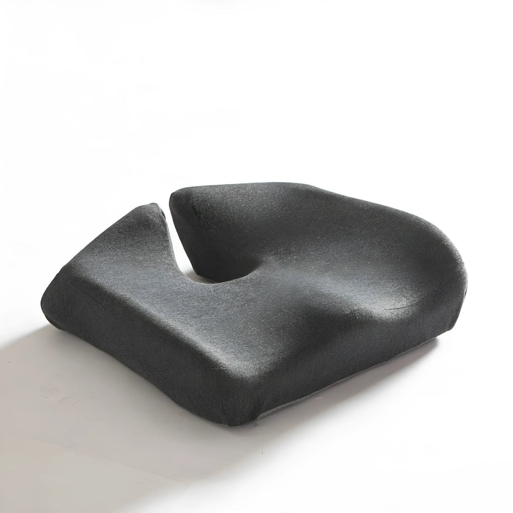 A solid-colour memory foam office chair cushion measuring 36x40x11 cm on a desk chair.