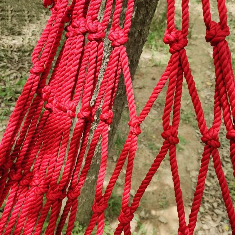 Nylon rope mesh hammock suspended outdoors showing 1.1m width and open construction