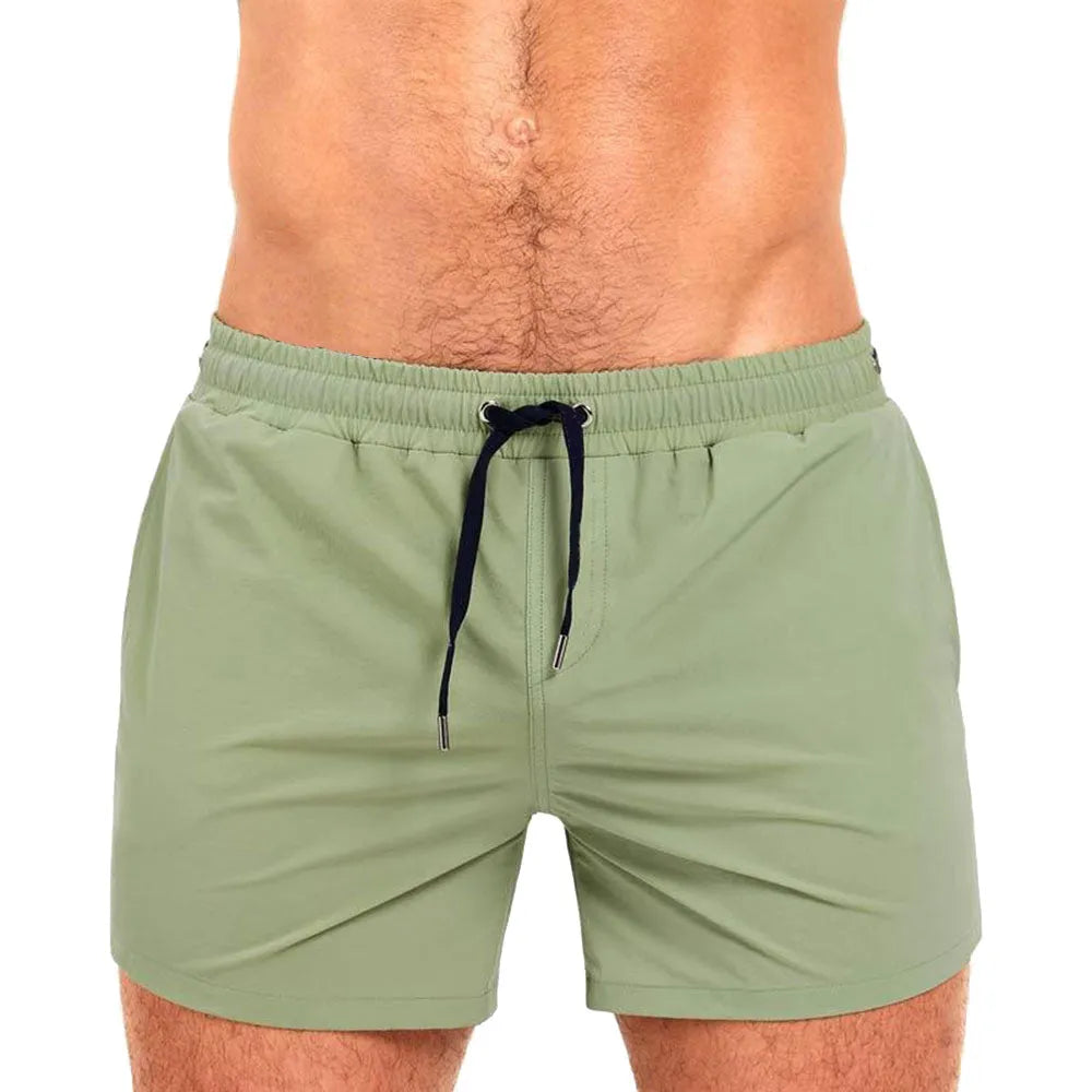 Mesh lining swimming sports fitness shorts in polyester available in six solid colours