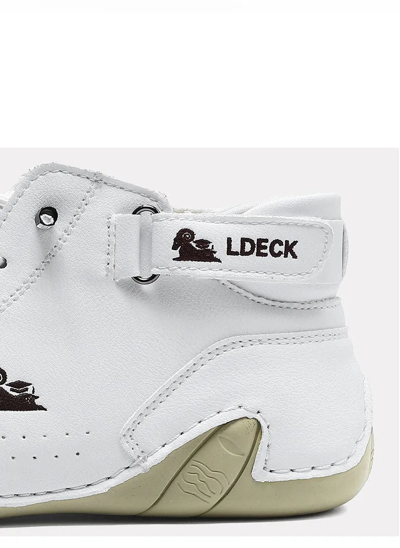 Men's khaki high top octopus shoes with round toe and mid-cut design on a rubber sole.