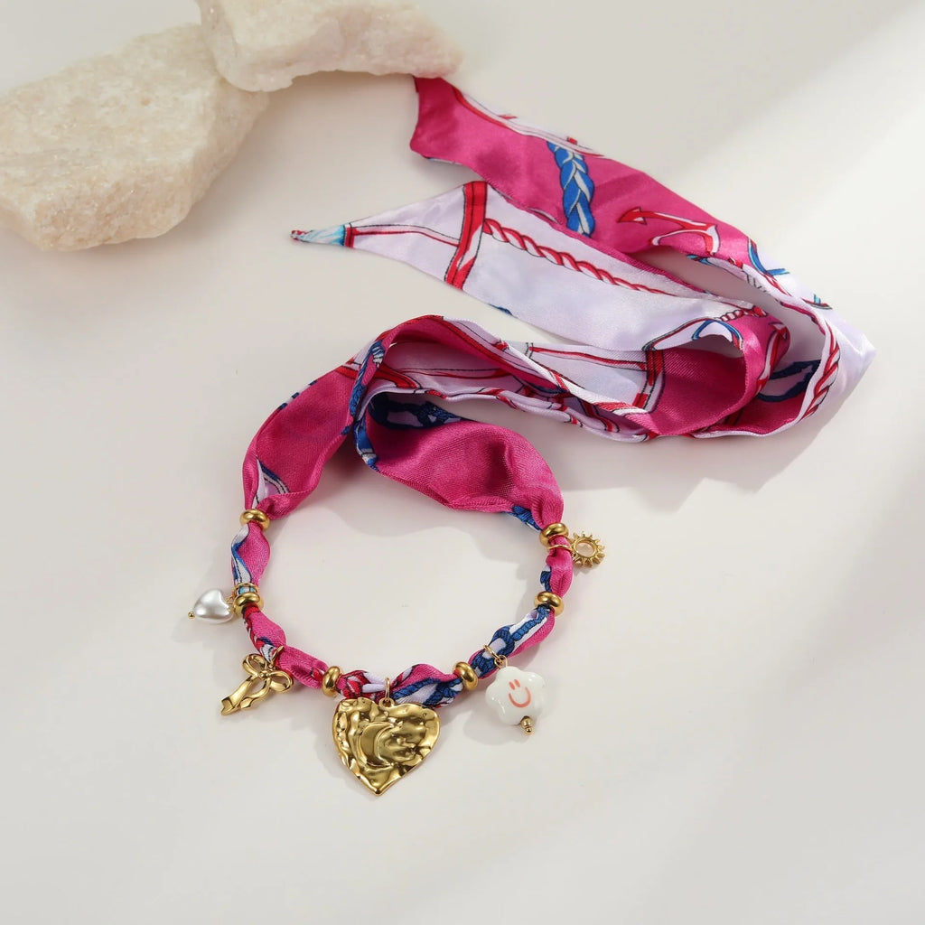 Stainless steel necklace and bracelet set with colourful silk scarf print pendant on geometric chain