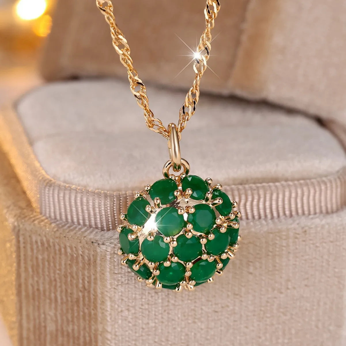 Women's gold plated copper necklace with emerald diamond geometric pendant on adjustable chain