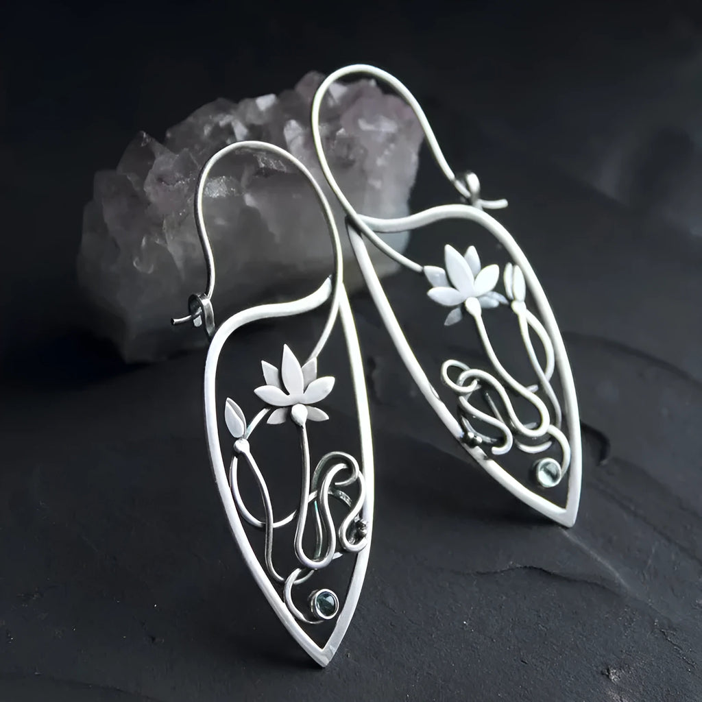 Silver lotus vine floral earrings with geometric elements and rhinestone accents