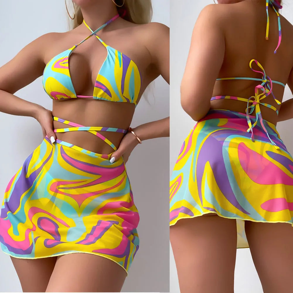 Yellow striped halter-neck lace-up bikini top with matching skirt and shorts.