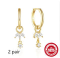 925 sterling silver geometric earrings with a zircon-inlaid sunflower design in golden-three diamonds colour.