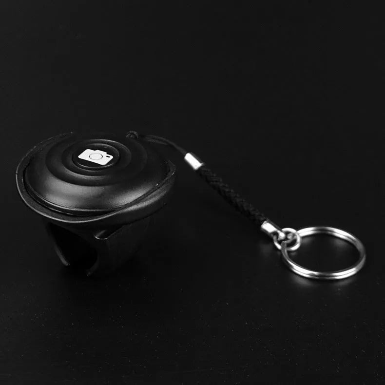 Black Snap Bluetooth remote control for wireless selfie photography with over 10 metre range