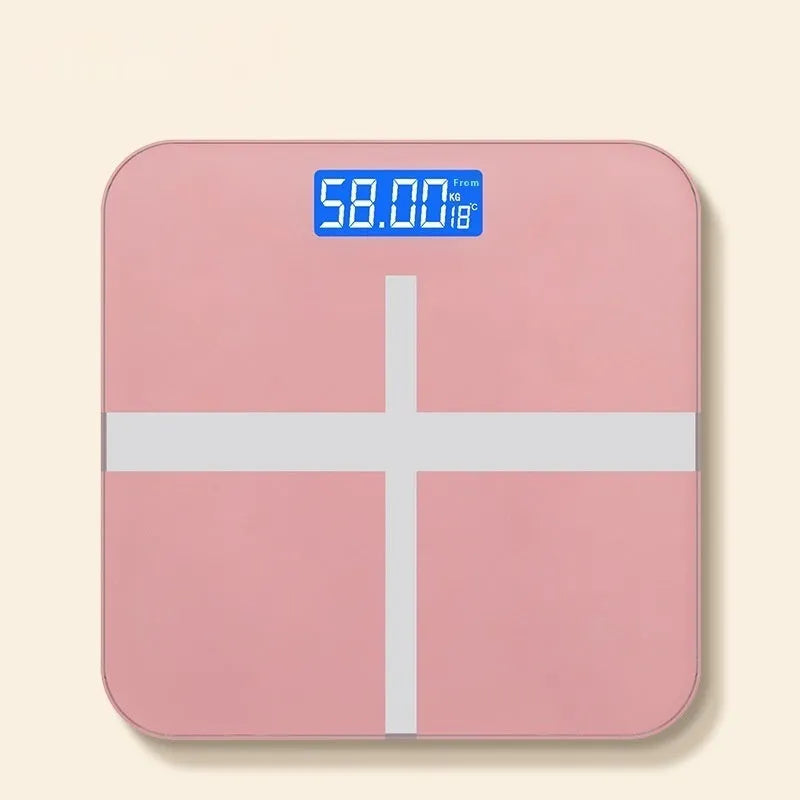 Household weighing scale in rose gold finish with digital display for body weight measurement