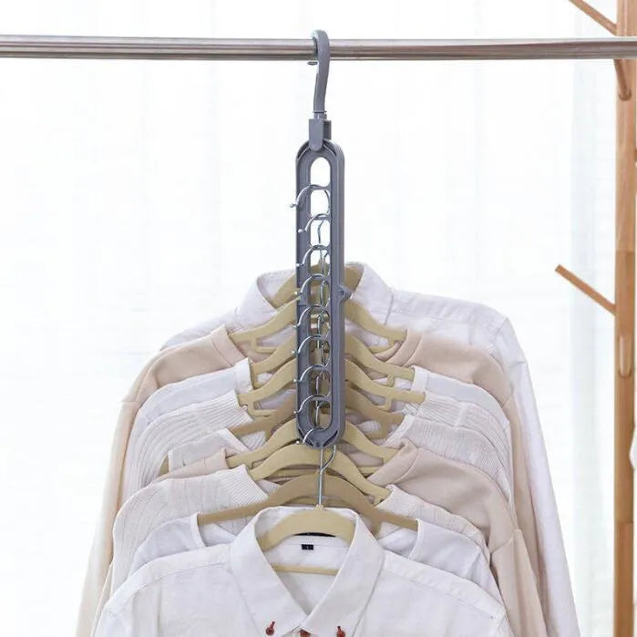 Plastic coat hanger with rotating hook in pink colour, showing length and height dimensions