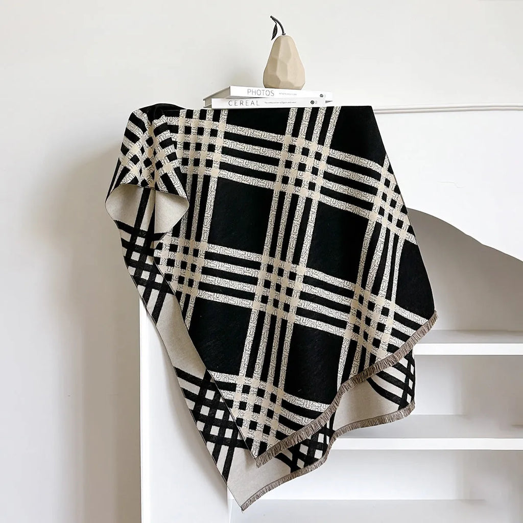 Long brown cashmere-like winter scarf with tassels laid flat showing its full 185cm length.