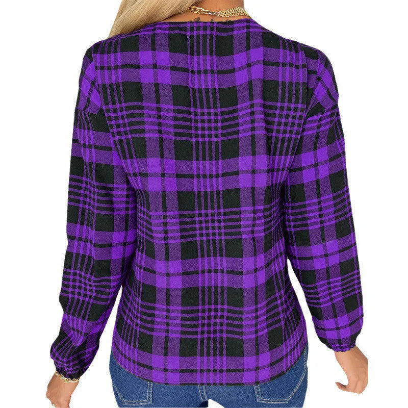 Women's purple and grey plaid loose-fit casual shirt with regular sleeves, laid flat.
