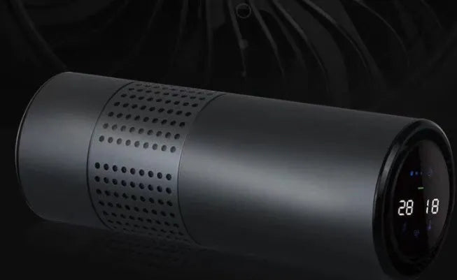 Aluminium alloy car air purifier with digital display showing air quality, temperature, and humidity readings.