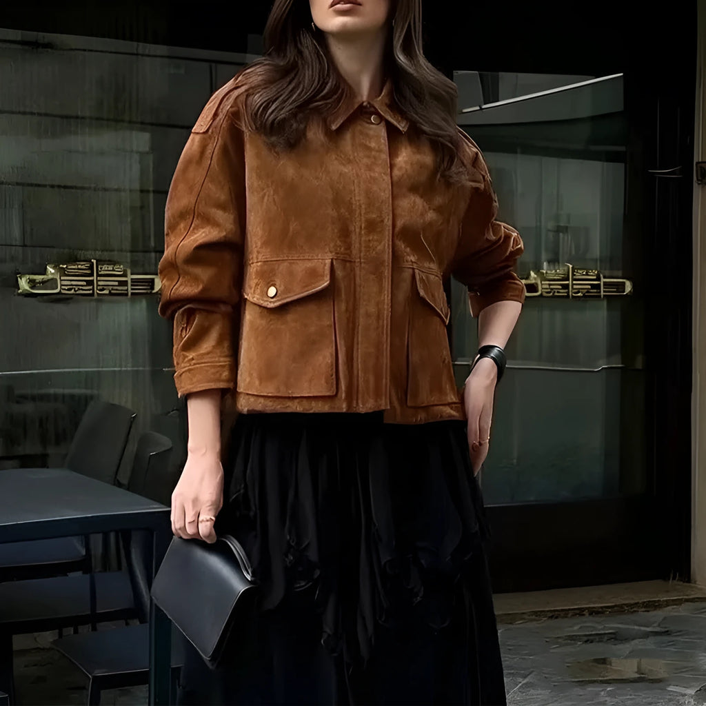 Women's bright brown suede-style street chic coat with regular sleeves on a hanger