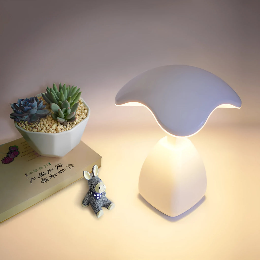 White modern LED desk lamp with touch controls and built-in battery for bedside use