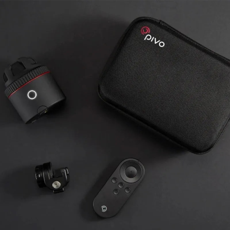Black PIVO 360-degree rotating smartphone facial tracking camera mount on flat surface