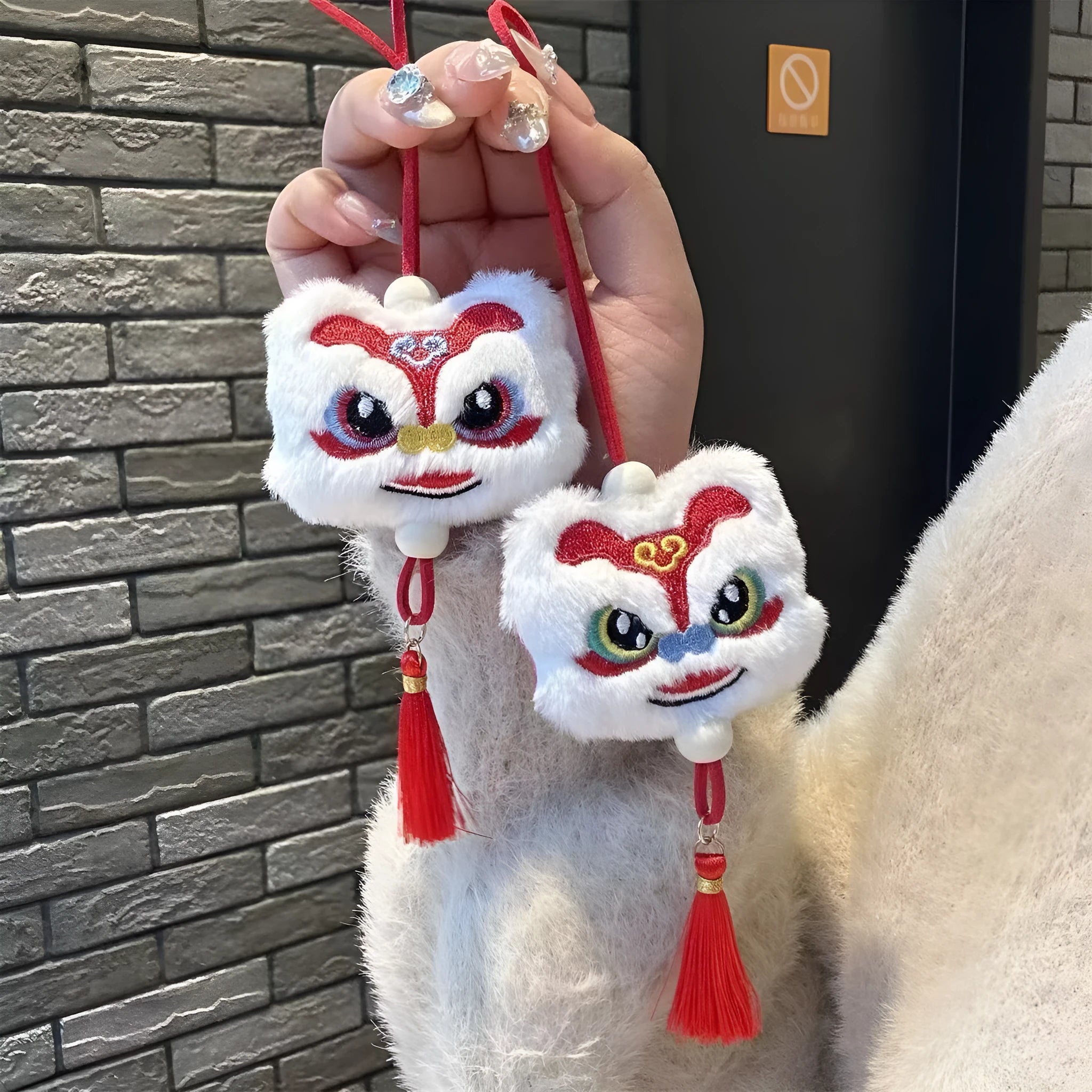 Chinese style blue and yellow plush lion keychain ornament with star stone decoration and cartoon styling