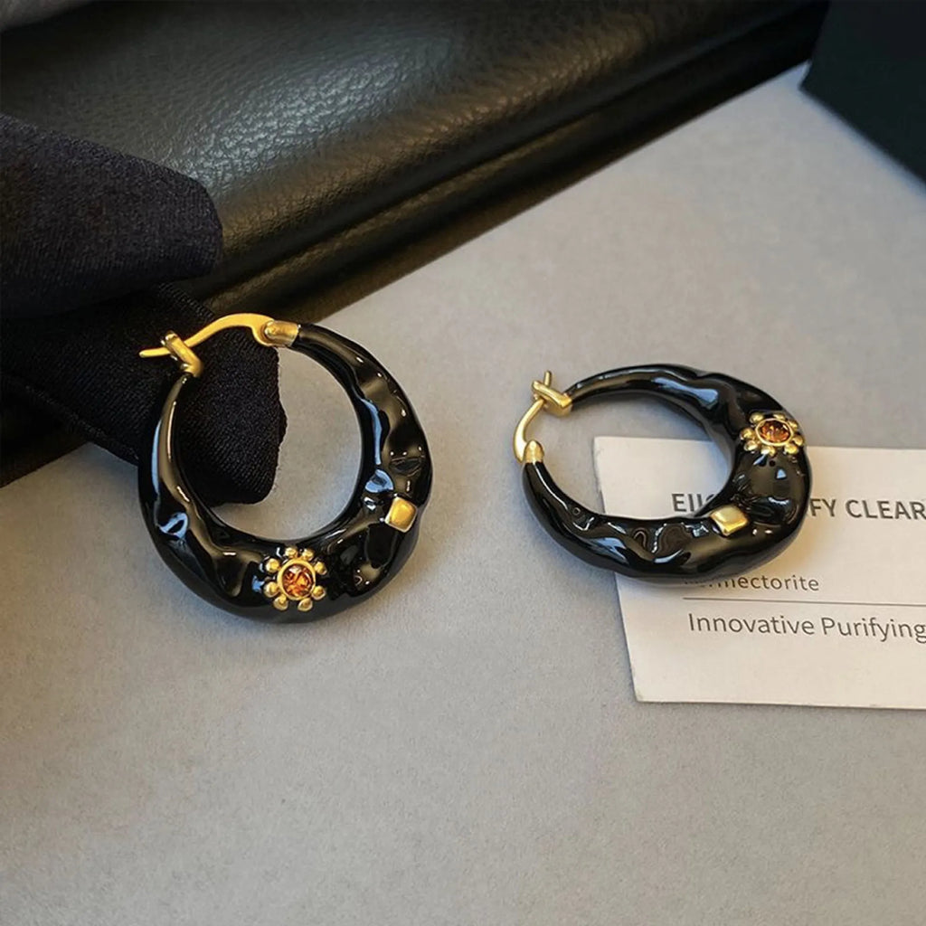 Hong Kong style retro ear studs with drip oil texture and rhinestone decoration in black and red colours