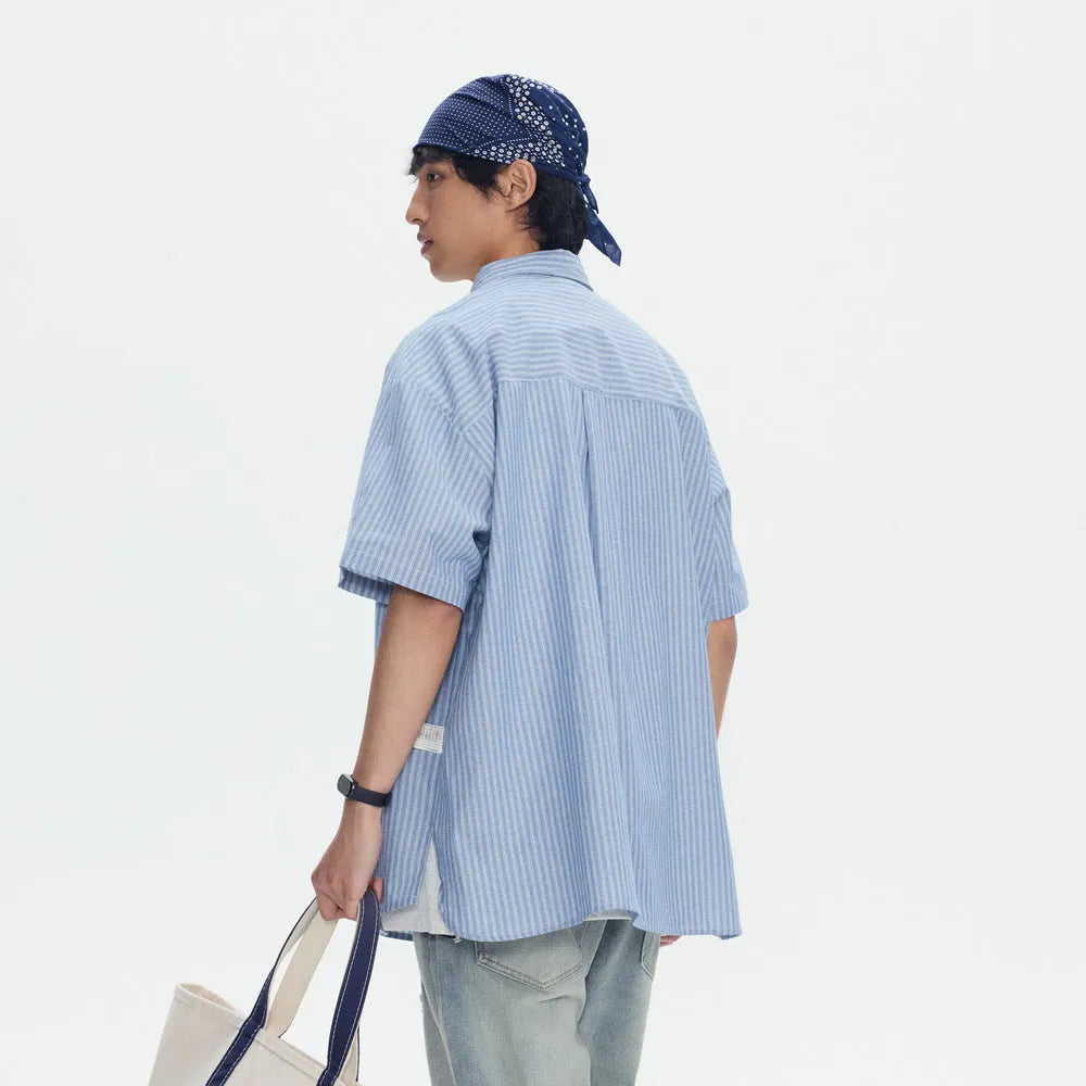 Blue striped short-sleeved shirt overalls with cardigan style on mannequin