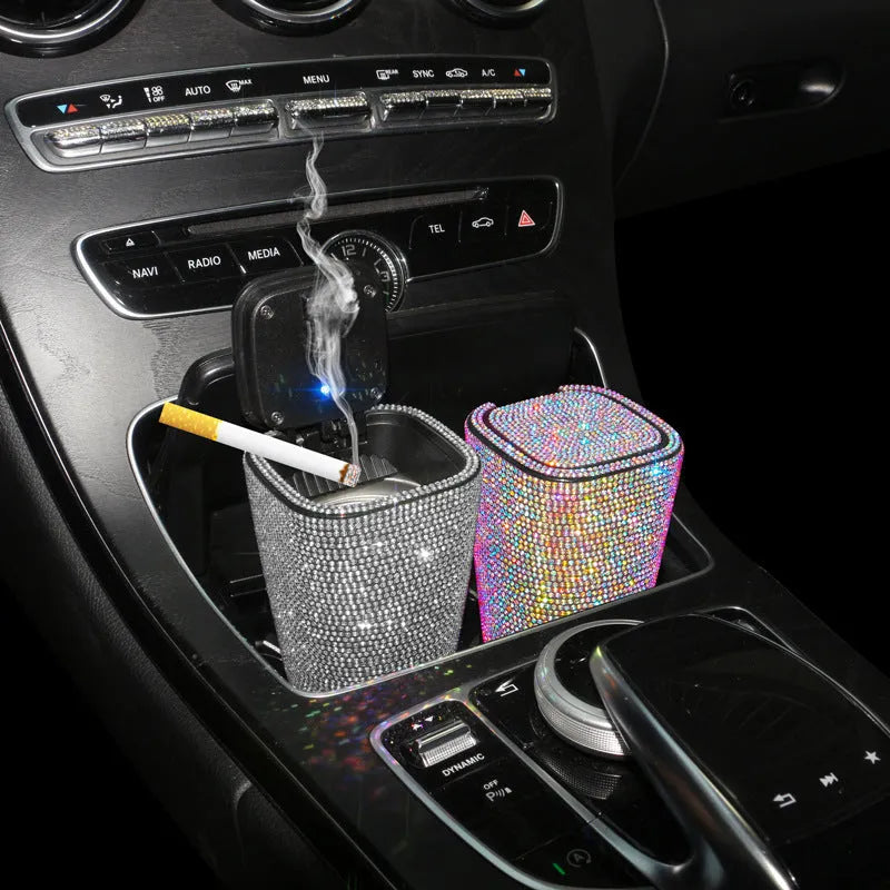 Diamond-embedded car ashtray with lid, air outlet hanging design, plastic cast body, available in nine colours.