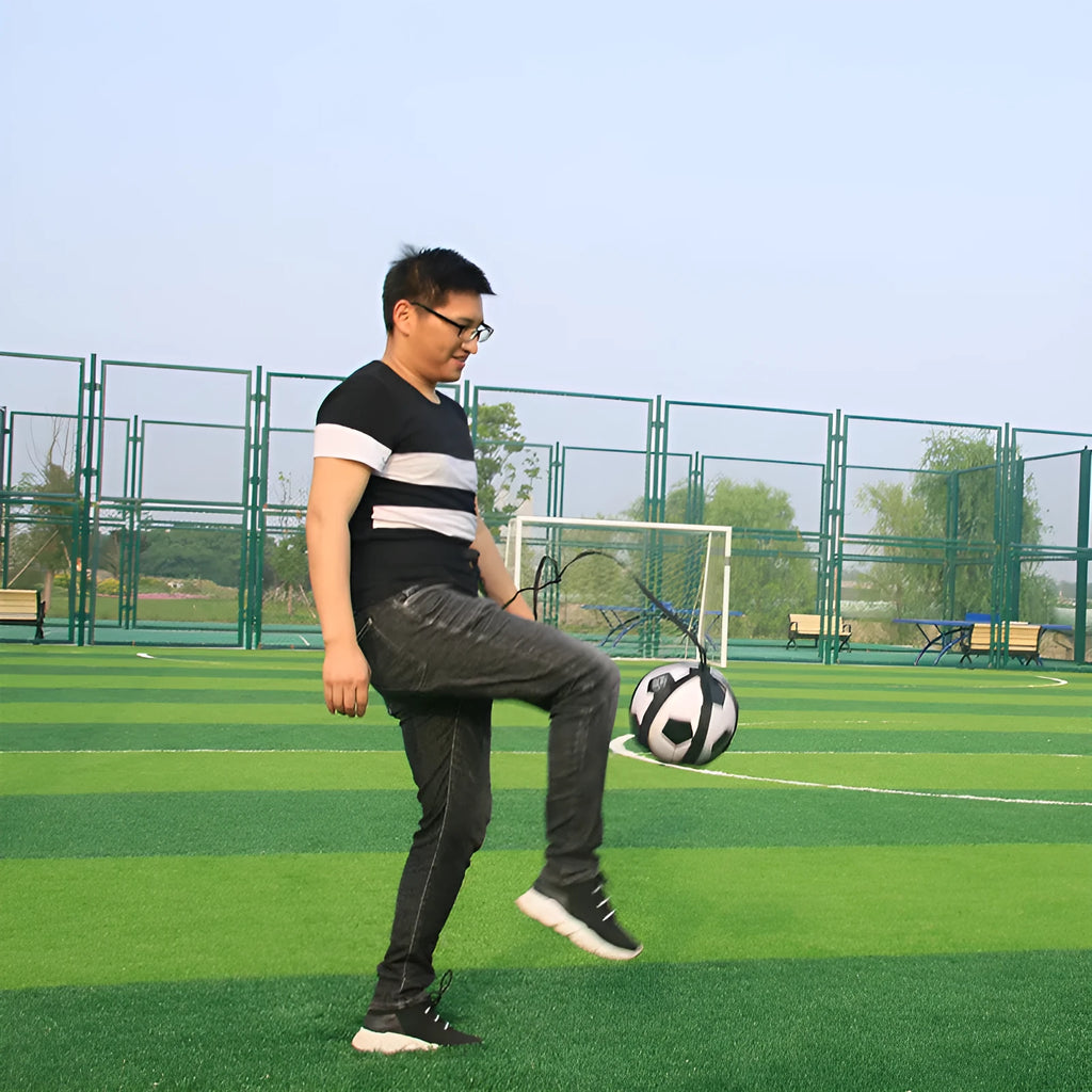 Black football juggling belt with rotating mechanism for training drills