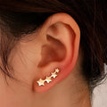 Pair of copper leaf design clip-on earrings for women with KC Golden Star finish