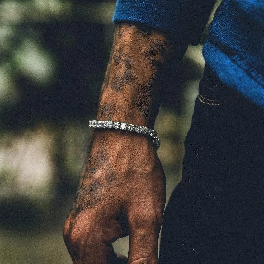 Men's silver hip hop bracelet with single row iced out rhinestones on chain link geometry design