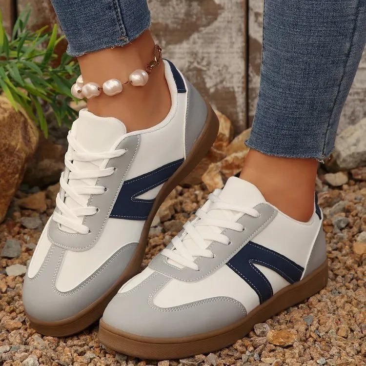 Blue women's low-top lace-up training shoes with artificial PU upper and rubber sole for hiking.